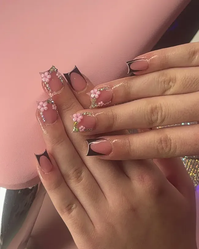 Elegant pink flower nails with crystal accents