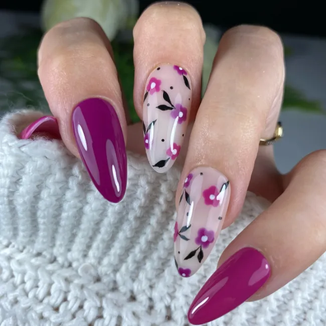 Purple floral nails with glossy finish